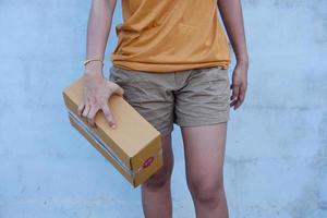 woman holding a parcel box photo