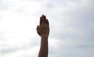 Human hands open palm up worship background photo