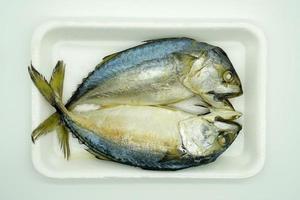 Steamed mackerel in a rattan tray photo