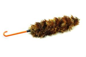 Room duster made of chicken feathers. on a white background photo