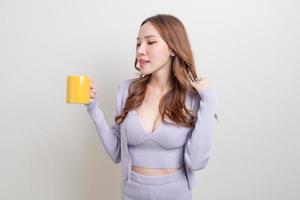 portrait beautiful Asian woman holding coffee cup or mug photo