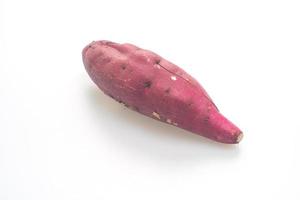 fresh Japanese sweet potatoes on white background photo