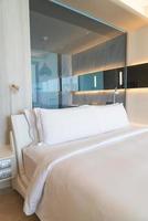 white comfortable pillows decoration on bed photo