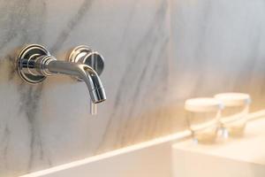 close-up tap in luxury bath room photo