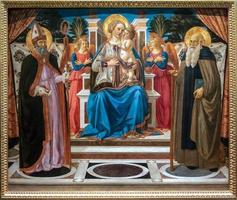 FLORENCE, TUSCANY, ITALY, 2019. Madonna and child enthroned with angels St Nicholas and St Anthony the Abbot painting in the Uffizi gallery photo