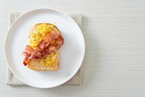 bread toast with scramble egg and bacon photo