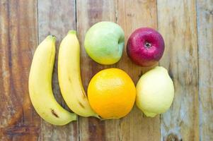 The fruits of health lover Healthy fruit And health care to eat healthy food. To the skin. The fruit is placed in a beautiful table, apple apricot photo