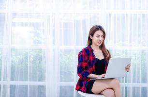 Women working on young architect projects. Photo of a woman working on a new startup project in a modern attic. general design notebook Designer's work concept