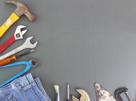 Happy Labor day , International father's day - Many worker handy tools on gray background. Top view with copy space photo