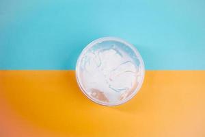 top view of hair gel on color background photo