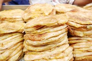 stack of roti chapati display for sale photo