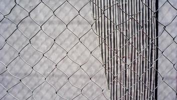 textura de pared de hormigón con fondos de malla foto