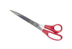Red scissors isolated on a white background photo