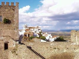 view of an old town in the sun photo