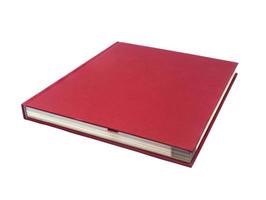 Red notebook  on white. photo