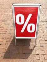 customer stopper sign advertising sale photo