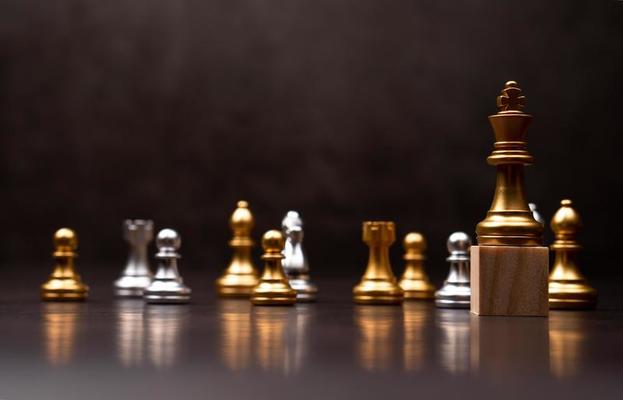 Premium Photo  Golden king chess is last standing in the chess