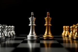 Golden and silver Chess king pieces Invite face to face and There are chess pieces in the background. Concept of competing, leadership and business vision for a win in business games photo