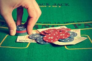 Man betting with poker chips. Horizontal image. Vintage style.