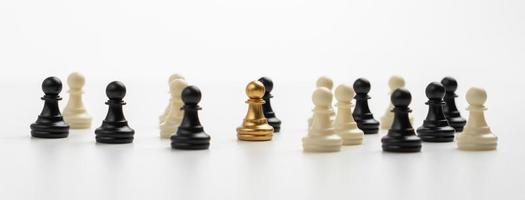 Golden Chess pawn standing to Be around of other chess, Concept of a leader must have courage and challenge in the competition, leadership and business vision for a win in business games photo