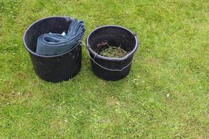 Gardening equipment on grass with empty space photo