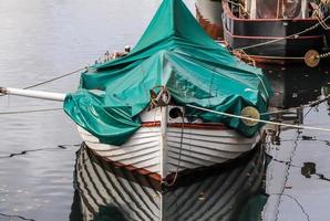 Detailed close up detail of ropes and cordage in the rigging of an old wooden vintage sailboat photo