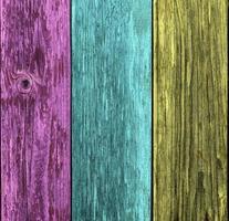 Weathered rainbow colored wooden plank background. Texture with copy space. photo