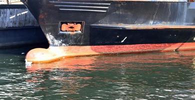 Different bollards and technical installations of vessel traffic at a port photo