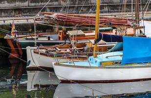 Detailed close up detail of ropes and cordage in the rigging of an old wooden vintage sailboat photo