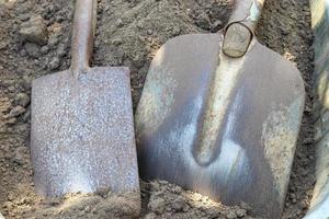 Gardening equipment on grass with empty space photo