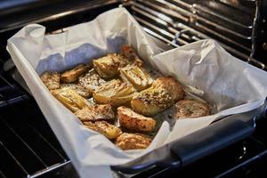 Stewed chicory on sheet in an electric stove after baking, according to recipe from the Internet photo