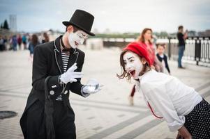 Mime on the street waiting to meet with his lover photo