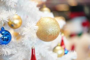 Christmas tree white and green colour and new year decoration in the department store. photo