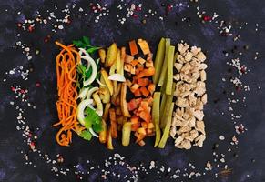 Ingredients for shawarma sandwich on dark background. Top view photo