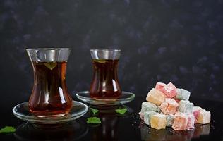 Turkish delights lokum on dark background photo