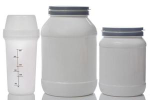 Jars with food supplements photo