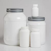 Jars with food supplements photo