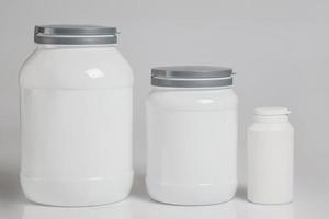 Jars with food supplements photo