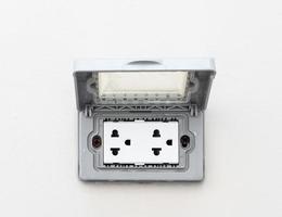 New electrical outlet with plastic cover. photo