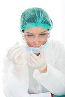 Chemist woman make experiment photo