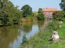 The village of Ditzum at the river Ems photo