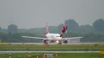 Airplane taxiing at rainy weather video