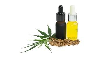 CBD hemp oil, Hemp oil extract in glass bottles , medical marijuana concept, on a white background, CBD oil pipette. photo