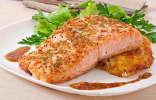 Baked salmon with honey-mustard sauce and potato gratin photo