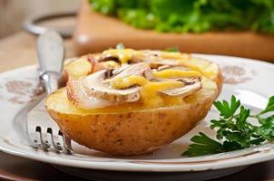 Baked potato with mushrooms and bacon photo