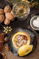 Baked apple with nuts, honey and oat flakes photo