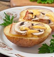 Baked potato with mushrooms and bacon photo