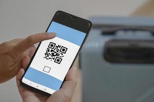 Concept of scanning a mobile QR CODE on a mobile phone. photo