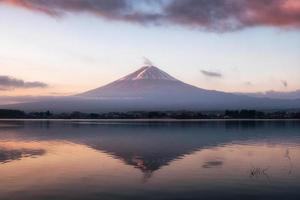 Mount volcano Fuji-san warmth reflection Kawaguchiko Lake at sunrise