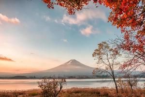 Mount Fuji with maple leaves covered in autumn